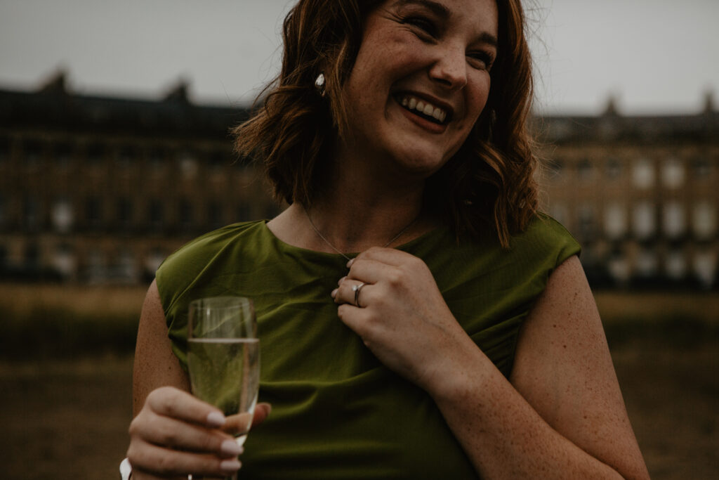 a woman smiling after being proposed to