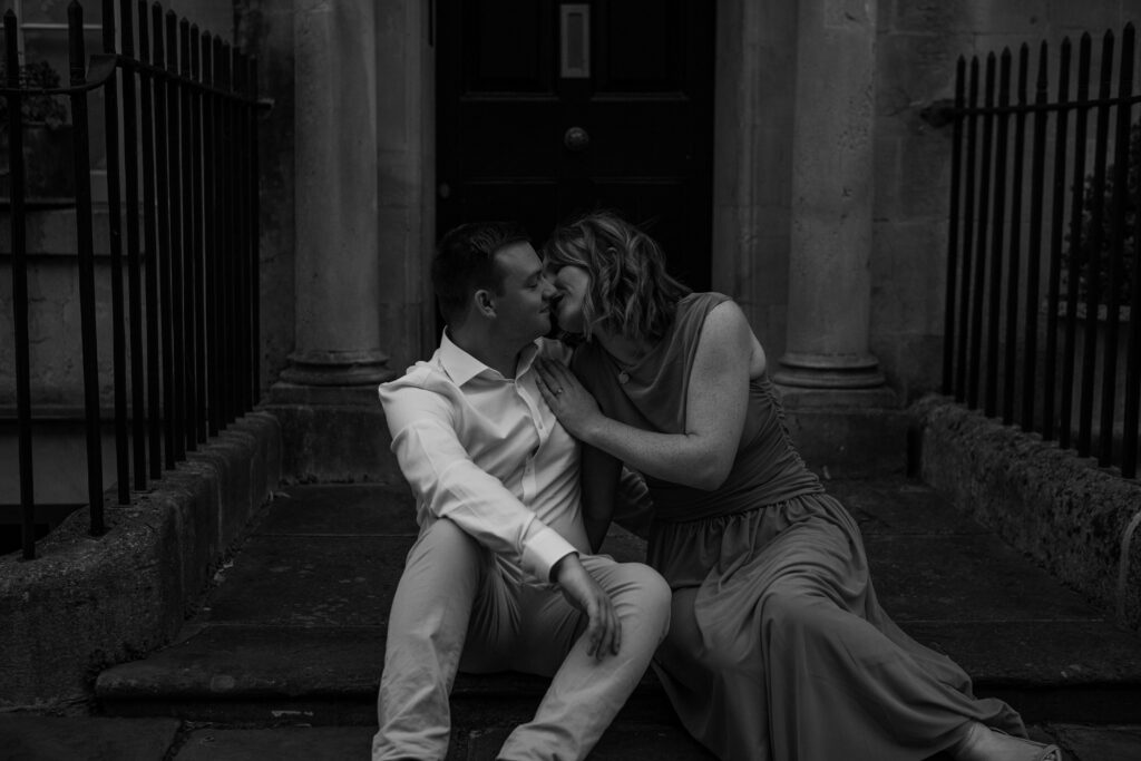 couple kissing after booking proposal photography