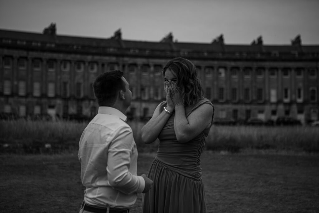 a surprised couple during a proposal photoshoot